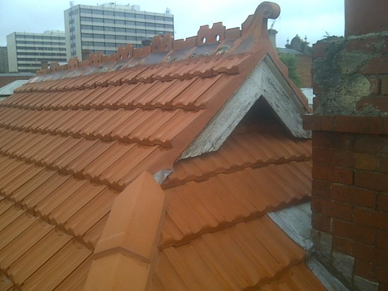 Obtaining a quote for roof tile repairs - Guardian Roofing
